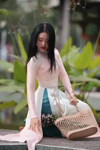 Captivating Grace: Vietnamese Girl in Traditional Ao Dai Beauty 1000025136-9