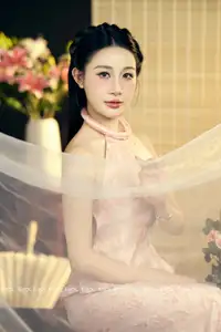 Serene Asian Beauty: Discover A Graceful Woman In A Traditional Pink Dress Amidst Blossoms.-3