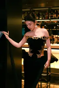 Radiant in Blue: A Woman's Elegant Charm Shines Bright in a Luxurious-3