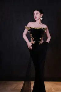 Radiant in Blue: A Woman's Elegant Charm Shines Bright in a Luxurious-7