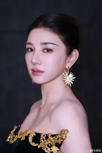 Radiant in Blue: A Woman's Elegant Charm Shines Bright in a Luxurious-2