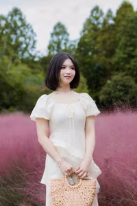 XVG No.33: Ethereal Beauty in White Dress Amidst Dreamy Pink Grass Field - A Serene Nature Escape-7