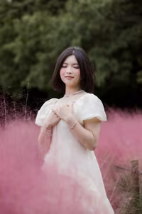 XVG No.33: Ethereal Beauty in White Dress Amidst Dreamy Pink Grass Field - A Serene Nature Escape-2