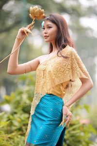 Traditional Vietnamese Beauty: Elegant Lady with Golden Lotus-1