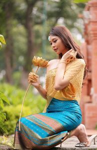 Traditional Vietnamese Beauty: Elegant Lady with Golden Lotus-14