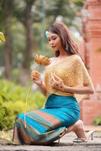 Traditional Vietnamese Beauty: Elegant Lady with Golden Lotus-5