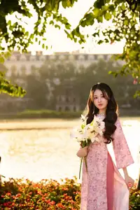 Captivating Vietnamese Beauty in Pink Ao Dai by the Lakeside at Sunset-8