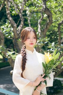 Youthful Vietnamese Girl in Pure White Silk Ao Dai with Yellow Lilies-5
