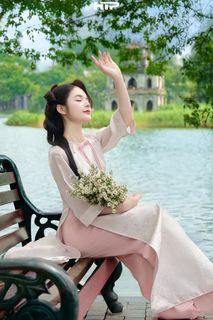 Gentle Beauty of Vietnamese Woman in Traditional Ao Dai at Hoan Kiem Lake-2