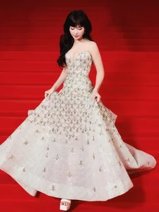 Stunning Red Carpet Elegance: Khả Ngân Shines as a Cinematic Muse in a Breathtaking Evening Gown and High-Fashion Glamour-0