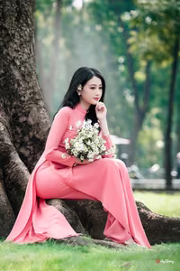 VGU No.18: Captivating Elegance A Young Woman in Pink Ao Dai-8