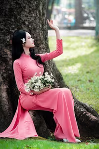 VGU No.18: Captivating Elegance A Young Woman in Pink Ao Dai-1