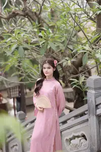 Graceful Pink Ao Dai: Vietnamese Girl showcases traditional beauty on ancient stairs-3