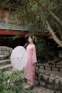 Graceful Pink Ao Dai: Vietnamese Girl showcases traditional beauty on ancient stairs-5