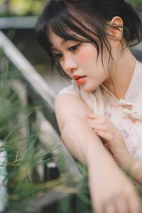 Elegant Ao Dai: Vietnamese Traditional Beauty in a Lush Garden-7