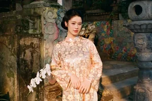 Han Hang radiates timeless grace in traditional Ao Dai after her journey into motherhood-0
