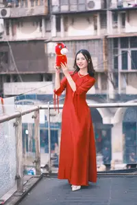 Vietnamese Girl's Bright Smile with Lucky Plush Horses in a Traditional Market.-3