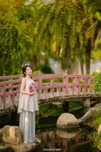 Graceful Young Woman in a Dreamy Garden: A Serene and Elegant Moment 1000025211-13
