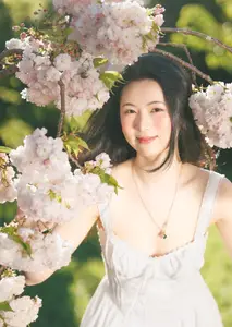 Spring Muse: Pristine Beauty and Grace Amidst Blooming Cherry Blossoms.-1
