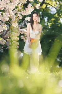 Spring Muse: Pristine Beauty and Grace Amidst Blooming Cherry Blossoms.-6