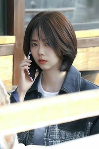 Chic Layered Bob Haircut for Round Faces - Trendy Short Hair for Beautiful Women-7