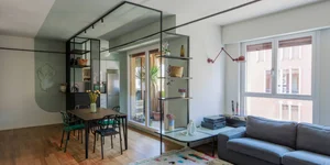 Milanese Minimalism: A Sun-Drenched 60m2 Apartment Redefined by Light and Iron Frames-2