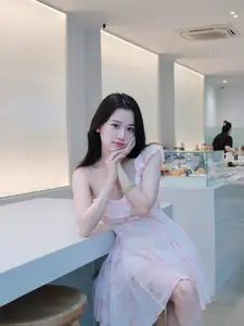 Gentle Charm: Beautiful Girl in Pink Floral Dress, Captivating Elegant Style.-6