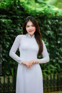 VGU No.87: Discover the captivating elegance of a Vietnamese girl in a pristine white Ao Dai.-3