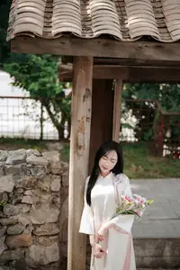 Timeless Elegance: Vietnamese Woman in Traditional Ao Dai Amidst Serene Backdrop-10