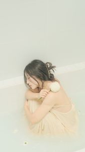Ethereal Girl in Bathtub with White Flower: Serene Beauty & Relaxing Moment 1000018799.jpg-2