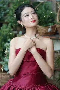 VGU No.187: Charming Woman in Red Dress Shines with Elegant Christmas Style. Discover Festive Fashion & Holiday Grace!-0