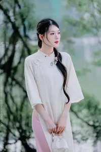 Elegant Beauty of a Vietnamese Woman in Ao Dai by a Peaceful Lake-3