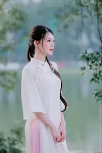 Elegant Beauty of a Vietnamese Woman in Ao Dai by a Peaceful Lake-0