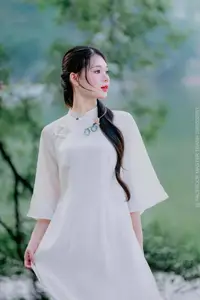 Elegant Beauty of a Vietnamese Woman in Ao Dai by a Peaceful Lake-4