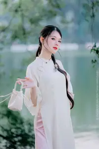 Elegant Beauty of a Vietnamese Woman in Ao Dai by a Peaceful Lake-2