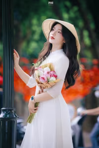 XVG No.45: Captivating Grace: Vietnamese Girl in White Ao Dai, Embracing Youthful Elegance-5
