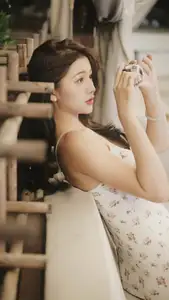 Captivating East Asian Beauty in Floral Slip Dress with Vintage Camera-1