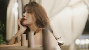 Captivating East Asian Beauty in Floral Slip Dress with Vintage Camera-5