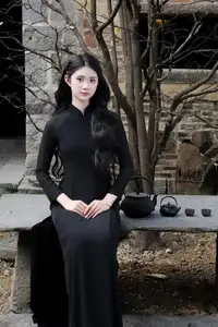 Timeless Beauty: Graceful Vietnamese Lady in Black Ao Dai Captivates with Asian Elegance.-9