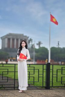 Elegant Vietnamese Woman in White Ao Dai, Conical Hat | Traditional Beauty-1