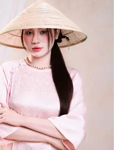 Vietnamese Beauty: Graceful in Traditional Pink Ao Dai and Conical Hat-4