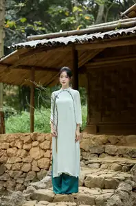 Vietnamese Grace: Elegant Portrait of a Young Woman in Lush Nature-11