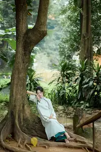 Vietnamese Grace: Elegant Portrait of a Young Woman in Lush Nature-13
