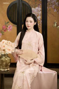 Radiant Grace in Soft Pink Silk Ao Dai: A Poetic Indochine Muse-11