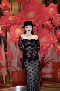 Quynh Kool Flaunts Captivating Beauty in Elegant Black Lace Dress, Stirring Visual Sensation-0
