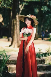 Captivating Vietnamese Beauty: Graceful Girl in Traditional Red Ao Dai-2