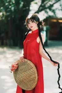 Captivating Vietnamese Beauty: Graceful Girl in Traditional Red Ao Dai-1