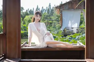 Discover Lu Xuan Xuan's Graceful Beauty in a White Dress Amidst a Serene Lotus Pond - XiuRen No.10630-11