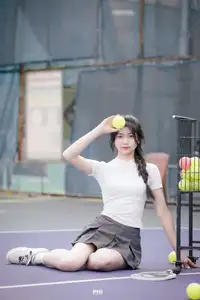 Pensive Break on Court: Young Tennis Player Recharges Energy After Intense Training Session-3