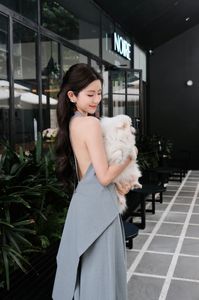 Elegant Woman and Adorable Pomeranian: Chic Fashion & Pet Joy.-10